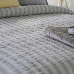 Colcha de verano Reig Martí modelo Pelton gris de venta online.