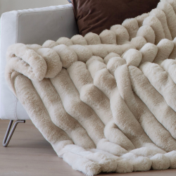 Manta plaid Antilo Bayron para sofá o cama, de venta online en Almacenes Julián Sánchez.