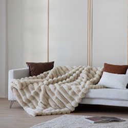 Manta plaid Antilo Bayron para sofá o cama, de venta online en Almacenes Julián Sánchez.